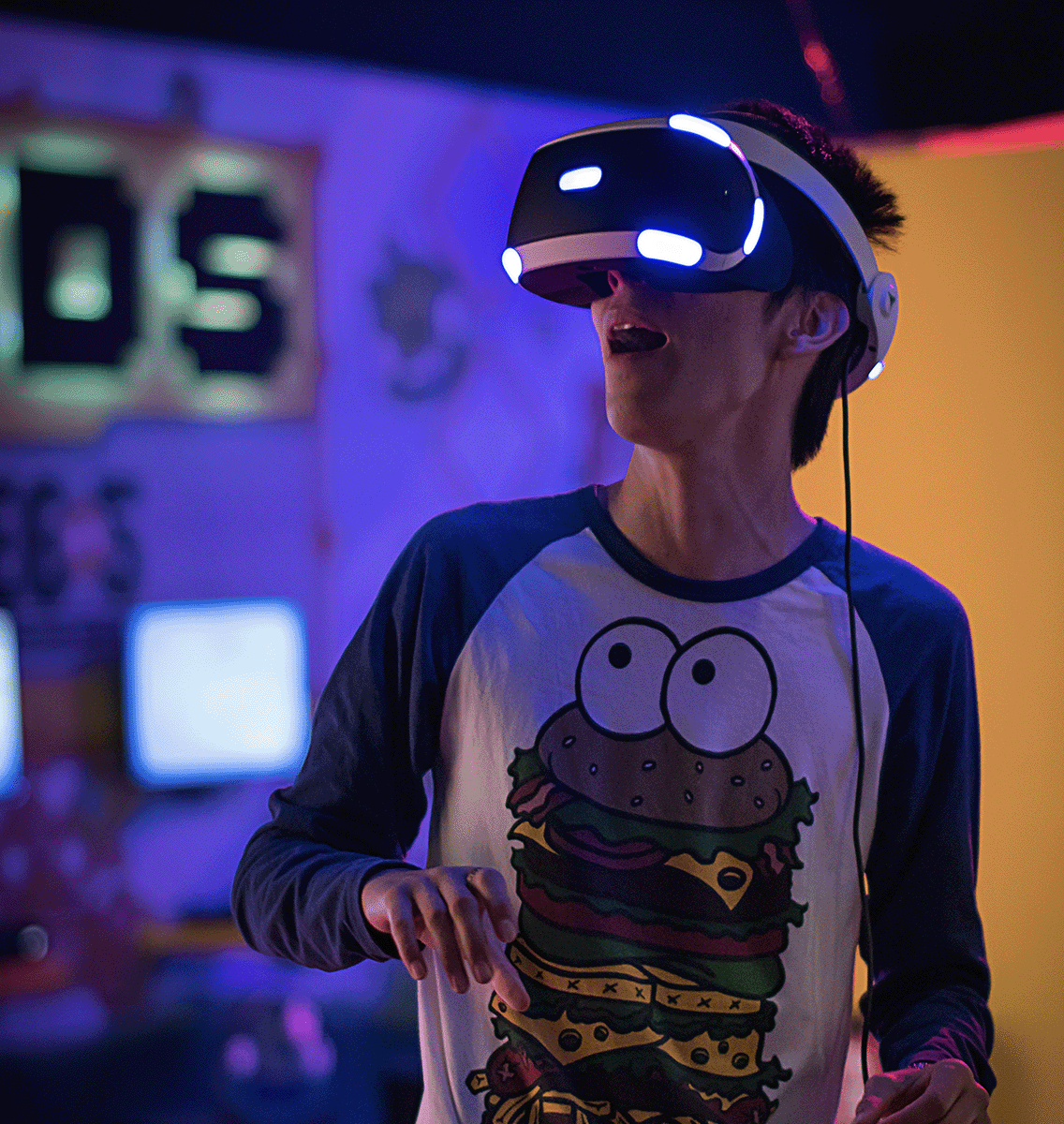A young designer experiencing a website on a virtual reality headset.